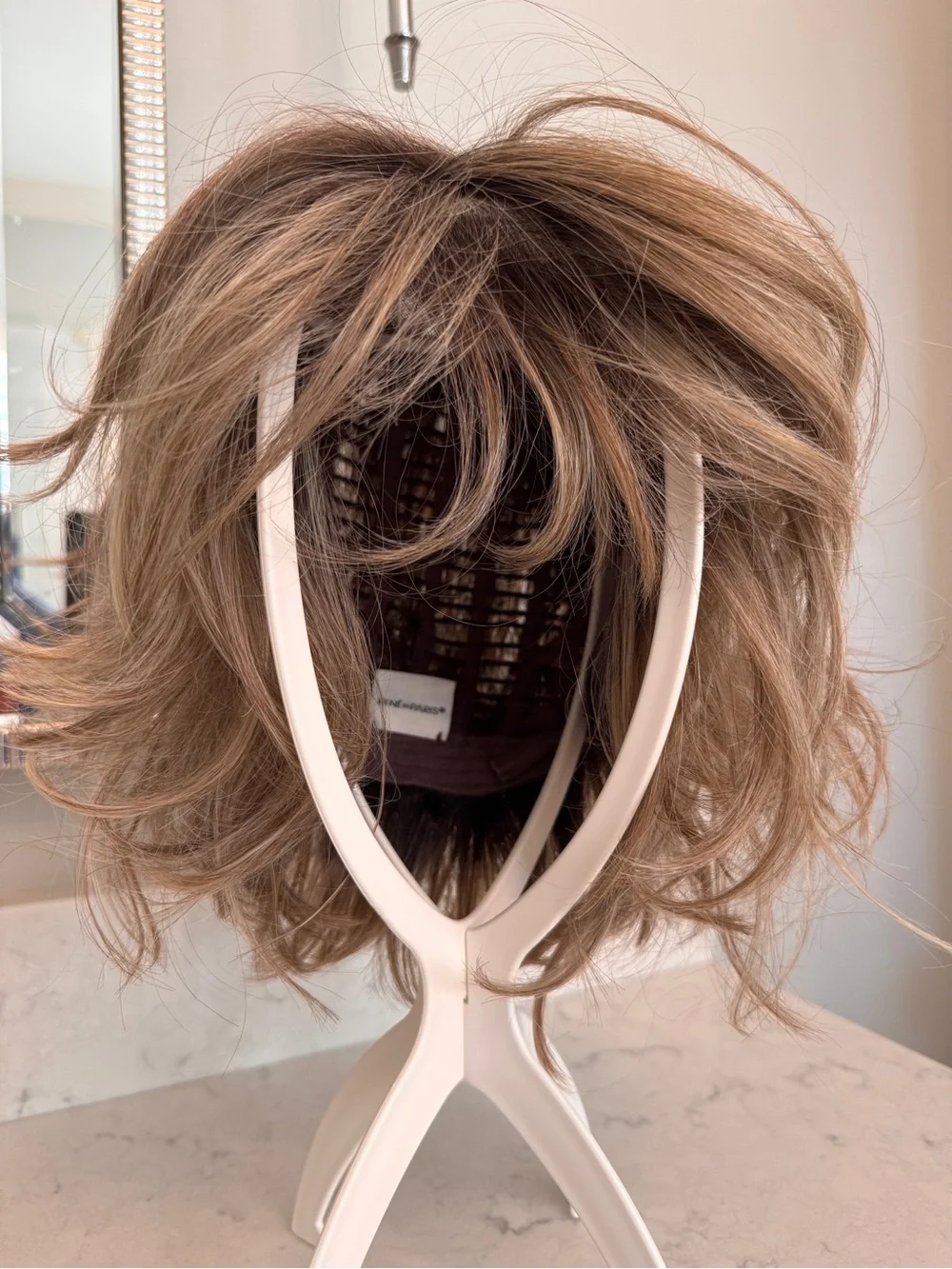 Rene of Paris - Brann in Sandy beige. Flirty lob with texture and dimension.
